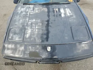 1985 Pontiac Fiero z VIN 1G2PM37R2FP239143, wystawiony jako Copart lot #45717405 z przebiegiem Nie podano mil oraz Tytuł czysty. Historia ofert i sprzedaży dostępna na DreamBid. Obrazek 11.