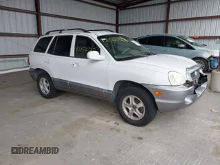 2004 Hyundai Santa Fe GLS with VIN KM8SC13D34U677767, listed as a IAAI auction lot 42054372 with 192,204 mi miles. Bid and sale history available at carsss.com. Image 1.