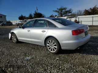 2015 Audi A6 2.0T Premium Plus with VIN WAUGFAFC4FN024606, listed as a Copart auction lot 50426205 with 79,507 mi miles and Salvage Title. Bid and sale history available at carsss.com. Image 2.