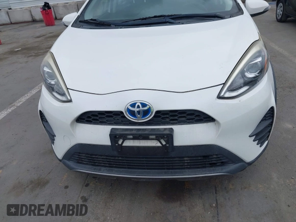 2018 Toyota Prius One with VIN JTDKDTB37J1615520, listed as a IAAI auction lot 42054113 with 76,989 mi miles and . Bid and sale history available at DreamBid. Image 12.