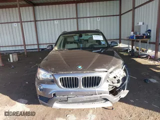 2013 BMW X1 28i with VIN WBAVM1C53DVW43228, listed as a IAAI auction lot 41301776 with 61,323 mi miles. Bid and sale history available at carsss.com. Image 12.
