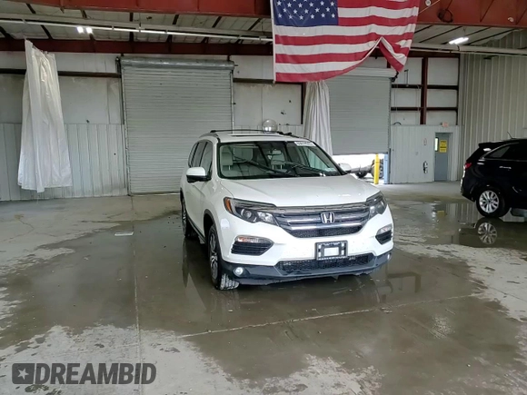2018 Honda Pilot EX-L with VIN 5FNYF6H58JB040611, listed as a Copart auction lot 63614525 with 148,656 mi miles and Salvage title. Bid and sale history available at DreamBid. Image 14.