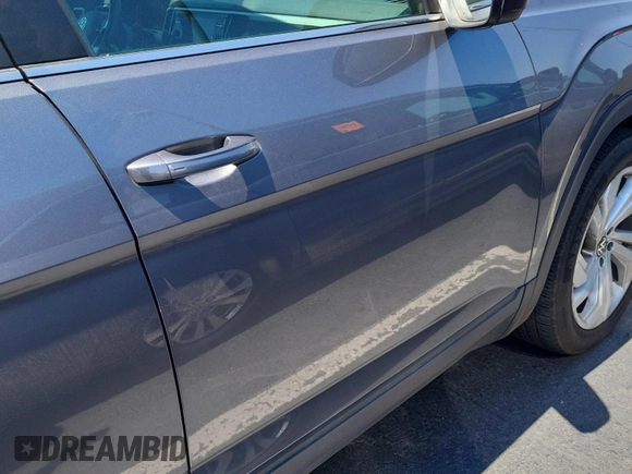 2023 Volkswagen Atlas SE z VIN 1V2HR2CA5PC526012, wystawiony jako IAAI lot #42796408 z przebiegiem 41 216 mil mil oraz . Historia ofert i sprzedaży dostępna na DreamBid. Obrazek 16.