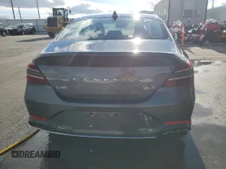 2023 Genesis G70 2.0T with VIN KMTG34TA4PU129199, listed as a Copart auction lot 80963124 with 15,729 mi miles and Salvage Title. Bid and sale history available at carsss.com. Image 6.