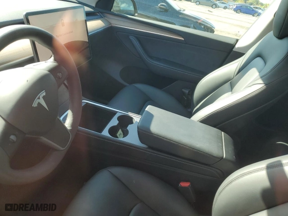 2023 Tesla Model Y Long Range with VIN 7SAYGDEE8PA025847, listed as a Copart auction lot 52580225 with 0 mi miles and Salvage Title. Bid and sale history available at carsss.com. Image 7.