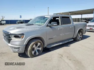 2021 Ram 1500 Laramie with VIN 1C6RREJT2MN593816, listed as a Copart auction lot 62094565 with 59,825 mi miles and Salvage title. Bid and sale history available at DreamBid. Image 1.