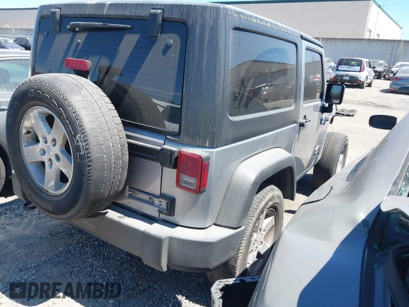 2017 Jeep Wrangler Sport with VIN 1C4GJWAG0HL621498, listed as a IAAI auction lot 42494667 with 92,284 mi miles and . Bid and sale history available at DreamBid. Image 4.