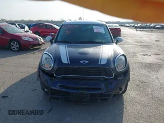 2013 MINI Countryman S ALL4 with VIN WMWZC5C58DWP33707, listed as a IAAI auction lot 41835234 with 98,441 mi miles and . Bid and sale history available at DreamBid. Image 12.