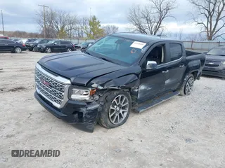 2021 GMC Canyon 4WD Denali with VIN 1GTG6EEN9M1221529, listed as a IAAI auction lot 41228498 with 67,727 mi miles. Bid and sale history available at carsss.com. Image 2.