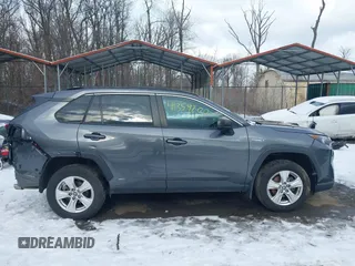 2021 Toyota RAV4 Hybrid LE with VIN 4T3LWRFV1MU025476, listed as a IAAI auction lot 41359200 with 70,468 mi miles and . Bid and sale history available at DreamBid. Image 13.