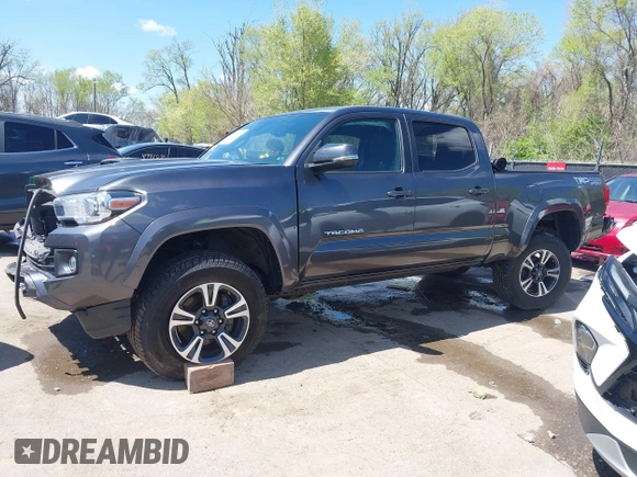 2018 Toyota Tacoma SR5 z VIN 3TMDZ5BN0JM051283, wystawiony jako IAAI lot #42008928 z przebiegiem 106 155 mil mil oraz . Historia ofert i sprzedaży dostępna na DreamBid. Obrazek 15.
