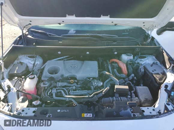 2024 Toyota RAV4 Hybrid LE with VIN 2T3UWRFVXRW229883, listed as a Copart auction lot 89095515 with 6,501 mi miles and Salvage title. Bid and sale history available at DreamBid. Image 11.