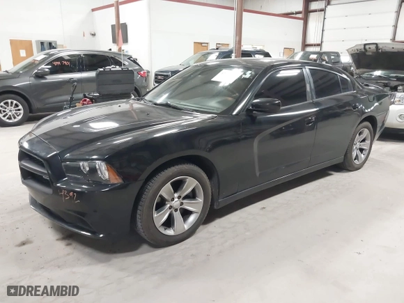 2011 Dodge Charger Road/Track with VIN 2B3CL5CT9BH511648, listed as a IAAI auction lot 42001157 with 103,223 mi miles. Bid and sale history available at carsss.com. Image 2.