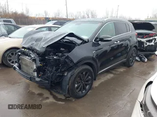 2018 Kia Sportage EX with VIN KNDPNCAC4J7409914, listed as a IAAI auction lot 41654833 with 142,057 mi miles and . Bid and sale history available at carsss.com. Image 2.