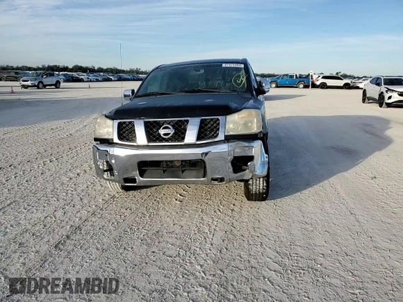 2004 Nissan Titan LE with VIN 1N6AA07A74N516071, listed as a Copart auction lot 87472284 with 140,011 mi miles and Salvage Title. Bid and sale history available at DreamBid. Image 11.