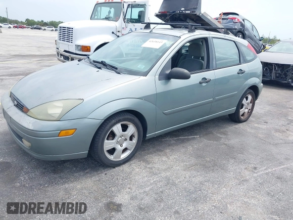 2004 Ford Focus with VIN 3FAFP37Z74R103228, listed as a IAAI auction lot 42658143 with 90,519 mi miles and . Bid and sale history available at DreamBid. Image 2.