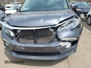 2016 Honda Pilot EX-L with VIN 5FNYF6H53GB004091, listed as a IAAI auction lot 42002063 with 173,009 mi miles. Bid and sale history available at carsss.com. Image 6.