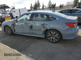 2023 Honda Civic Sedan EX with VIN 2HGFE1F77PH322020, listed as a Copart auction lot 42788765 with 54,779 mi miles and Salvage Title. Bid and sale history available at carsss.com. Image 2.