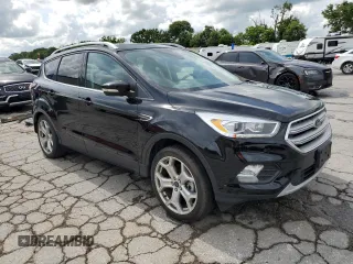2018 Ford Escape Titanium with VIN 1FMCU0J92JUC84901, listed as a Copart auction lot 60428635 with 69,210 mi miles and Salvage title. Bid and sale history available at DreamBid. Image 4.