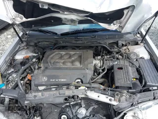 1999 Acura TL with VIN 19UUA5657XA021688, listed as a IAAI auction lot 41997466 with 241,232 mi miles. Bid and sale history available at carsss.com. Image 10.