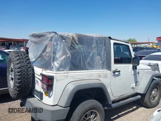 2007 Jeep Wrangler X with VIN 1J4FA24137L128418, listed as a IAAI auction lot 42317921 with 148,412 mi miles and . Bid and sale history available at DreamBid. Image 13.