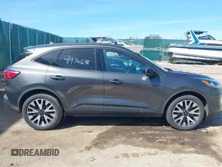 2020 Ford Escape SE Sport Hybrid with VIN 1FMCU9BZ0LUB81689, listed as a IAAI auction lot 41978638 with 69,831 mi miles and . Bid and sale history available at DreamBid. Image 13.