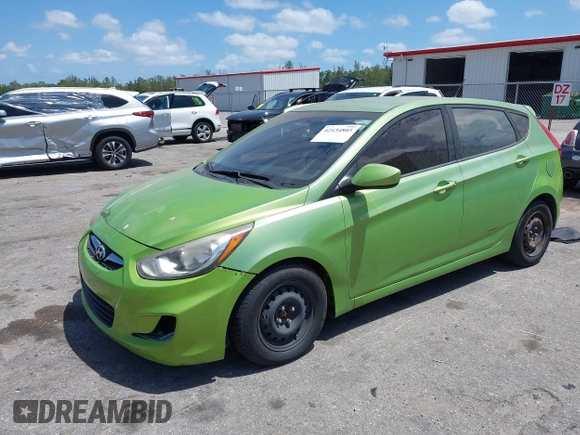 2012 Hyundai Accent SE with VIN KMHCU5AE4CU050210, listed as a IAAI auction lot 42134803 with 137,797 mi miles. Bid and sale history available at carsss.com. Image 2.