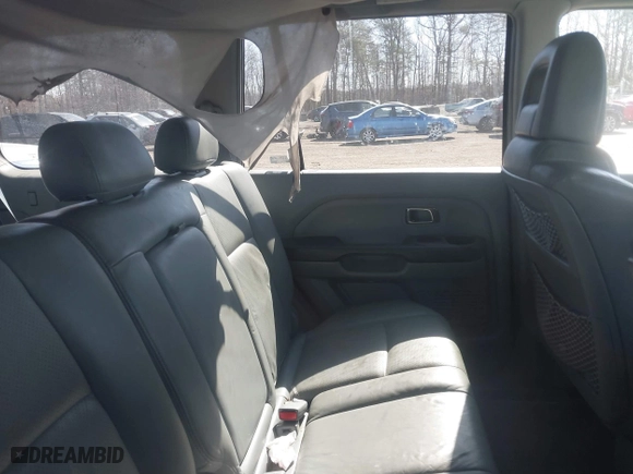 2005 Honda Pilot EX-L with NAVI with VIN 2HKYF18705H559938, listed as a IAAI auction lot 41814487 with 188,665 mi miles. Bid and sale history available at carsss.com. Image 8.