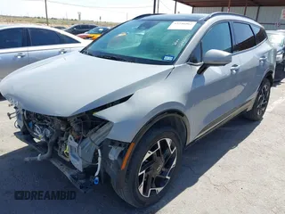 2024 Kia Sportage SX-Prestige with VIN 5XYK5CDF1RG143931, listed as a IAAI auction lot 42236962 with 23,461 mi miles and . Bid and sale history available at DreamBid. Image 2.