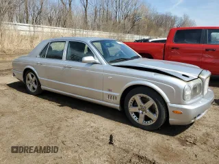 2004 Bentley Arnage z VIN SCBLF34F44CX09923, wystawiony jako Copart lot #52712015 z przebiegiem Nie podano mil oraz Tytuł czysty. Historia ofert i sprzedaży dostępna na DreamBid. Obrazek 4.