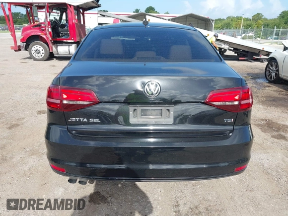 2016 Volkswagen Jetta SEL z VIN 3VWL07AJ2GM259395, wystawiony jako IAAI lot #42448235 z przebiegiem 101 032 mil mil oraz . Historia ofert i sprzedaży dostępna na DreamBid. Obrazek 16.