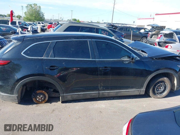 2018 Mazda CX-9 Sport with VIN JM3TCBBY6J0222750, listed as a IAAI auction lot 42294464 with 63,927 mi miles and . Bid and sale history available at DreamBid. Image 13.