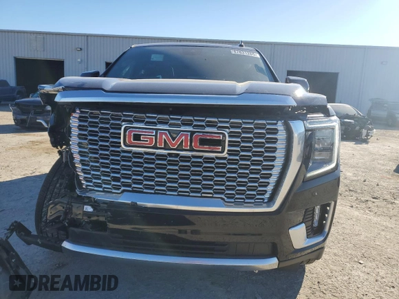 2024 GMC Yukon Denali with VIN 1GKS2DKL8RR173831, listed as a Copart auction lot 87831265 with 32,872 mi miles and Salvage Title. Bid and sale history available at carsss.com. Image 5.