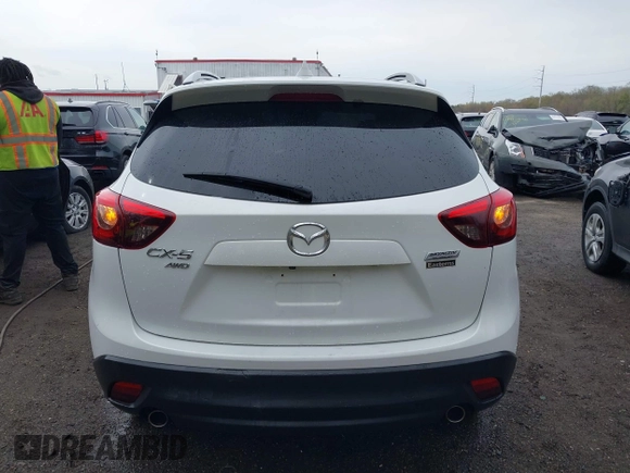 2016 Mazda CX-5 Grand Touring with VIN JM3KE4DY3G0838204, listed as a IAAI auction lot 41961049 with 98,918 mi miles and . Bid and sale history available at carsss.com. Image 16.