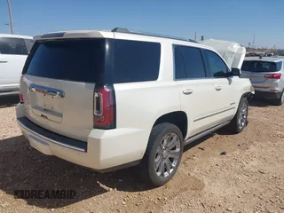 2015 GMC Yukon Denali with VIN 1GKS2CKJ3FR568729, listed as a IAAI auction lot 41741987 with 154,729 mi miles. Bid and sale history available at carsss.com. Image 4.