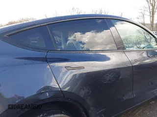 2024 Tesla Model Y Long Range with VIN 7SAYGDEE0RA300064, listed as a IAAI auction lot 41640541 with 5,049 mi miles and . Bid and sale history available at DreamBid. Image 14.