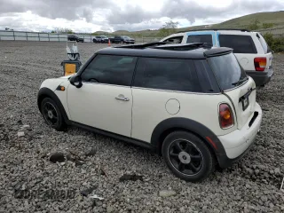 2007 MINI Hardtop with VIN WMWMF33567TT56922, listed as a Copart auction lot 56598665 with 66,605 mi miles and Salvage title. Bid and sale history available at DreamBid. Image 2.