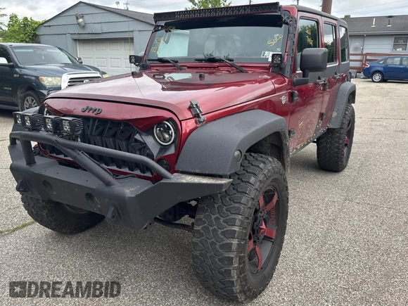 2012 Jeep Wrangler Unlimited Sport with VIN 1C4BJWDG5CL289329, listed as a Copart auction lot 65816775 with 152,632 mi miles and Clean title. Bid and sale history available at DreamBid. Image 2.