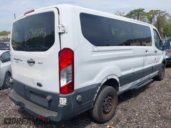 2015 Ford Transit XL with VIN 1FBZX2ZM8FKA20339, listed as a IAAI auction lot 42186096 with Not provided miles and . Bid and sale history available at DreamBid. Image 4.