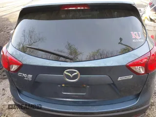 2016 Mazda CX-5 Touring with VIN JM3KE4CY5G0771252, listed as a IAAI auction lot 42138637 with 106,767 mi miles and . Bid and sale history available at carsss.com. Image 16.