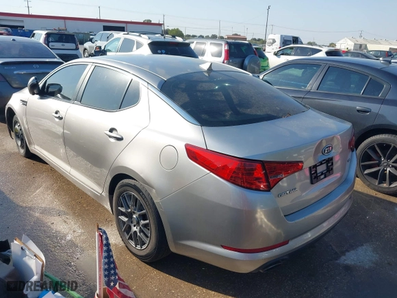 2011 Kia Optima LX with VIN KNAGM4A75B5127965, listed as a IAAI auction lot 40544326 with 207,760 mi miles. Bid and sale history available at carsss.com. Image 3.