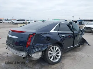2013 Cadillac XTS Luxury with VIN 2G61P5S34D9134111, listed as a IAAI auction lot 41623629 with 52,182 mi miles. Bid and sale history available at carsss.com. Image 4.