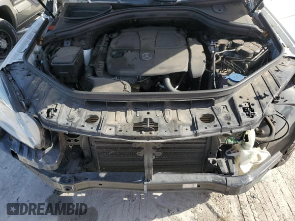 2014 Mercedes-Benz M 350 with VIN 4JGDA5JB0EA283475, listed as a Copart auction lot 57140295 with 105,777 mi miles and Salvage title. Bid and sale history available at DreamBid. Image 11.