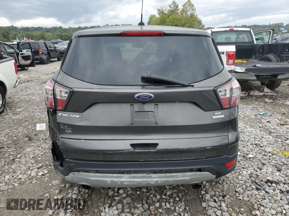 2017 Ford Escape SE with VIN 1FMCU0GD7HUB28357, listed as a Copart auction lot 73229554 with 121,912 mi miles and Salvage Title. Bid and sale history available at carsss.com. Image 7.