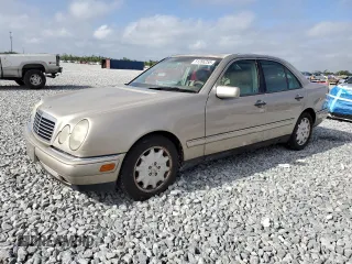 1999 Mercedes-Benz E with VIN WDBJF25H7XA934446, listed as a Copart auction lot 51386255 with 218,439 mi miles and Clean Title. Bid and sale history available at DreamBid. Image 1.