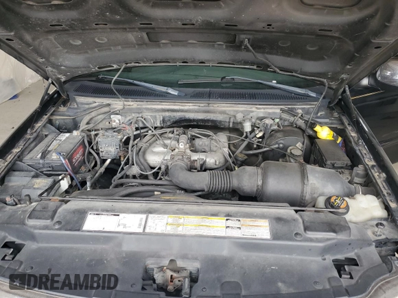 1999 Ford F-150 with VIN 1FTZX1723XNA24144, listed as a Copart auction lot 58071155 with 320,829 mi miles and Salvage title. Bid and sale history available at DreamBid. Image 11.