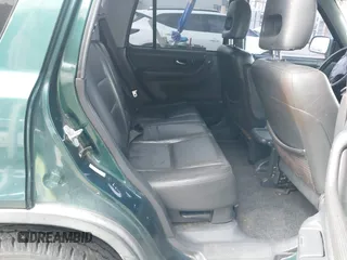 2000 Honda CR-V SE with VIN JHLRD1875YS022873, listed as a IAAI auction lot 42034984 with 210,853 mi miles. Bid and sale history available at carsss.com. Image 8.