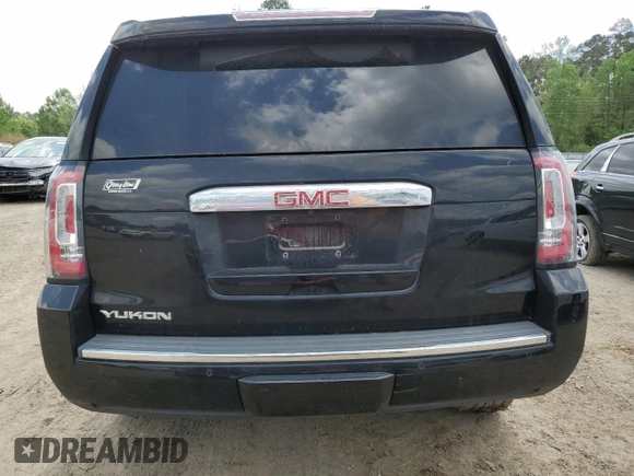 2019 GMC Yukon Denali with VIN 1GKS1CKJ0KR259491, listed as a Copart auction lot 51071335 with 105,294 mi miles and Salvage Title. Bid and sale history available at carsss.com. Image 6.