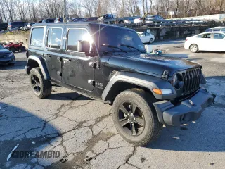 2021 Jeep Wrangler Unlimited Sport Altitude with VIN 1C4HJXDN0MW709609, listed as a Copart auction lot 84148934 with Not provided miles and Salvage title. Bid and sale history available at DreamBid. Image 4.