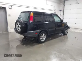 2001 Honda CR-V EX with VIN JHLRD17671S015194, listed as a IAAI auction lot 41431799 with 194,488 mi miles. Bid and sale history available at carsss.com. Image 4.
